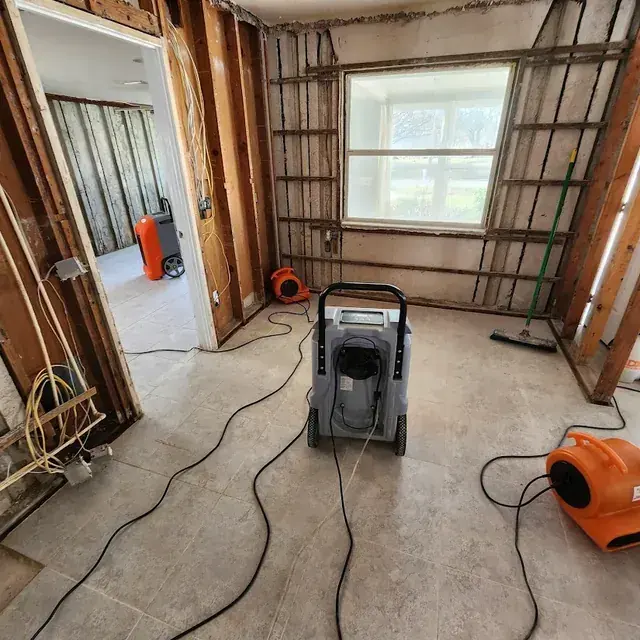 A crew drying a cleared Agoura Hills room with air movers