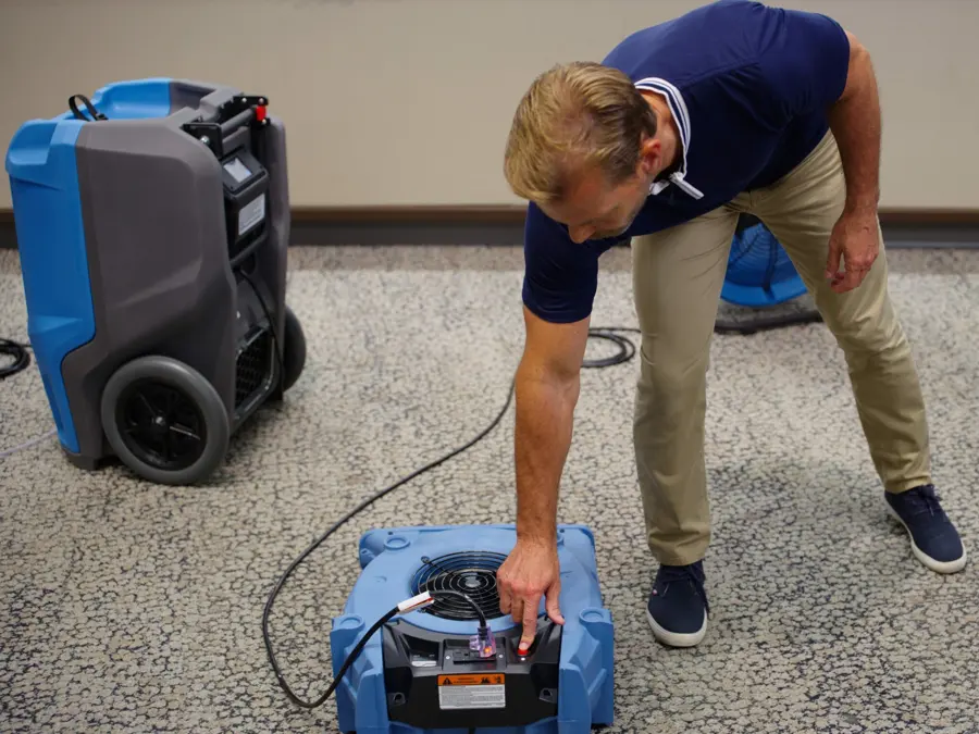 Air movers and a dehumidifier drying a room in an Agoura Hills, CA home
